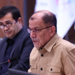 The head of the Iranian National Olympic Committee at the medal award ceremony of the world competitions
