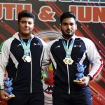 Images from the podium where Nasiri and Gholizadeh won medals in the 109 kg category at the World Youth Championships